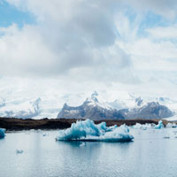 a glacial mountain with iceberg lake